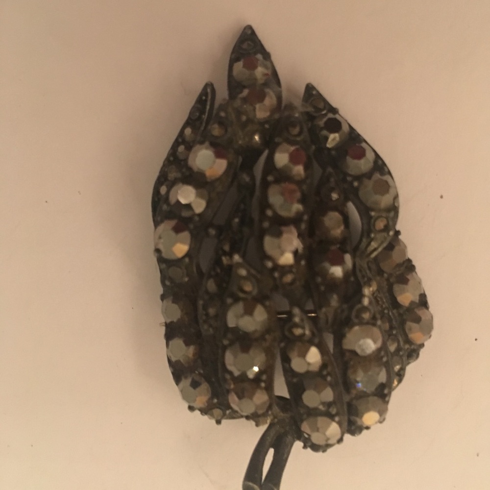 Three vintage antique brooches